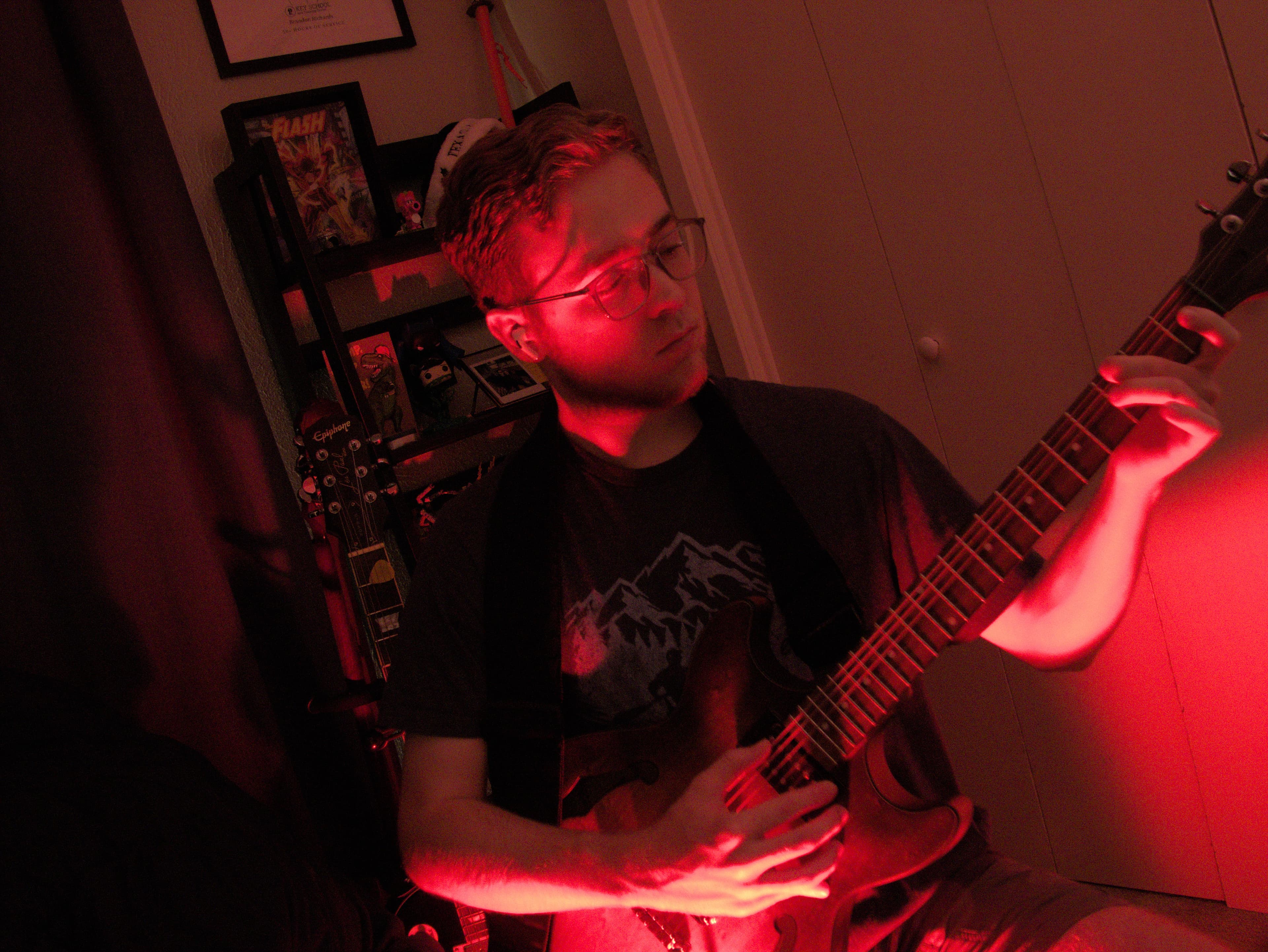 Guitarist under red light